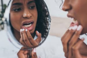 woman with tooth pain